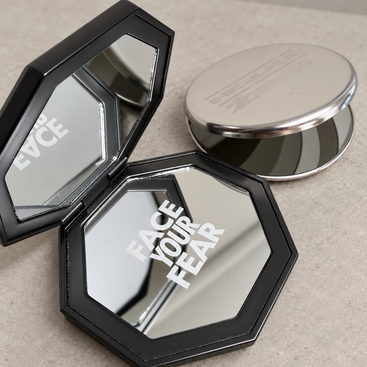 Pocket mirror with engraved lettering